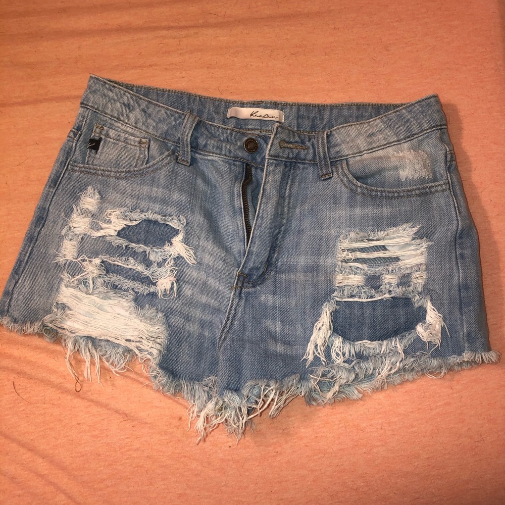 Distressed denim shorts
